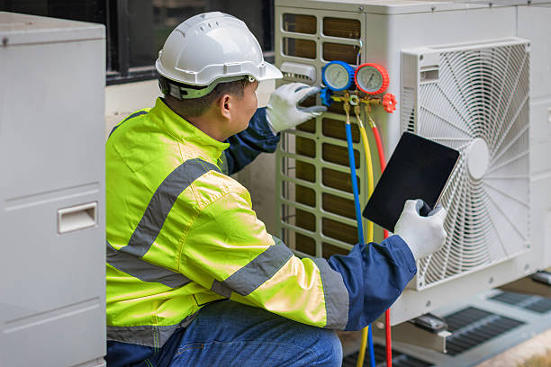 Professional Air Conditioning Repair technician working in Levittown, NY
